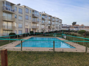 Hermoso depto en condominio, 1ra linea playa